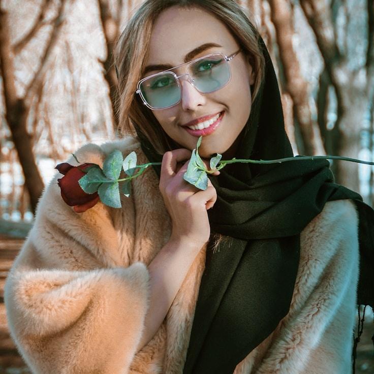 Kaveri Mehta, Lead Design Curator at Quiet Mount Path, reviewing corporate floral arrangements